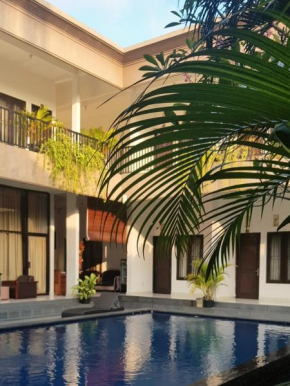 Отель Seminyak Point Guest House  Kuta